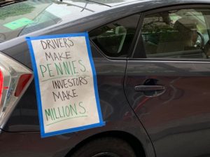 Rideshare drivers stage caravan scream over Uber’s labor practices