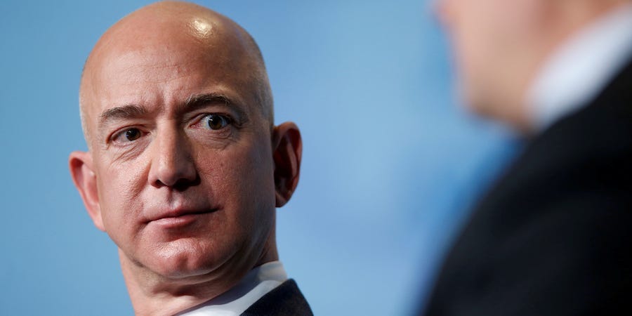 Amazon protesters space up guillotine exterior Jeff Bezos’ dwelling – Enterprise Insider