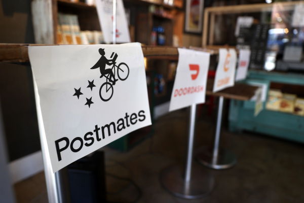 Postmates cuts losses in Q2 because it heads against tie-up with Uber